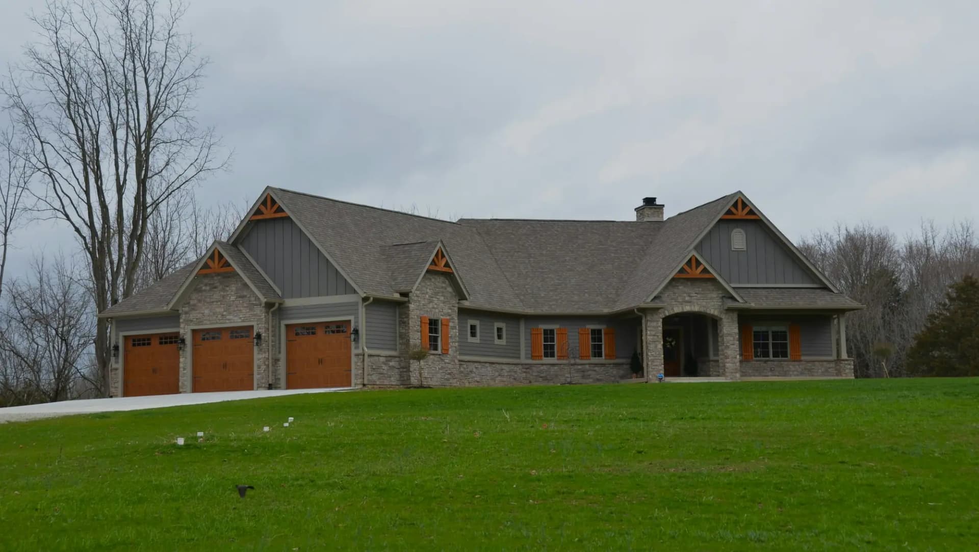 Custom home with stone accents and a two-car garage