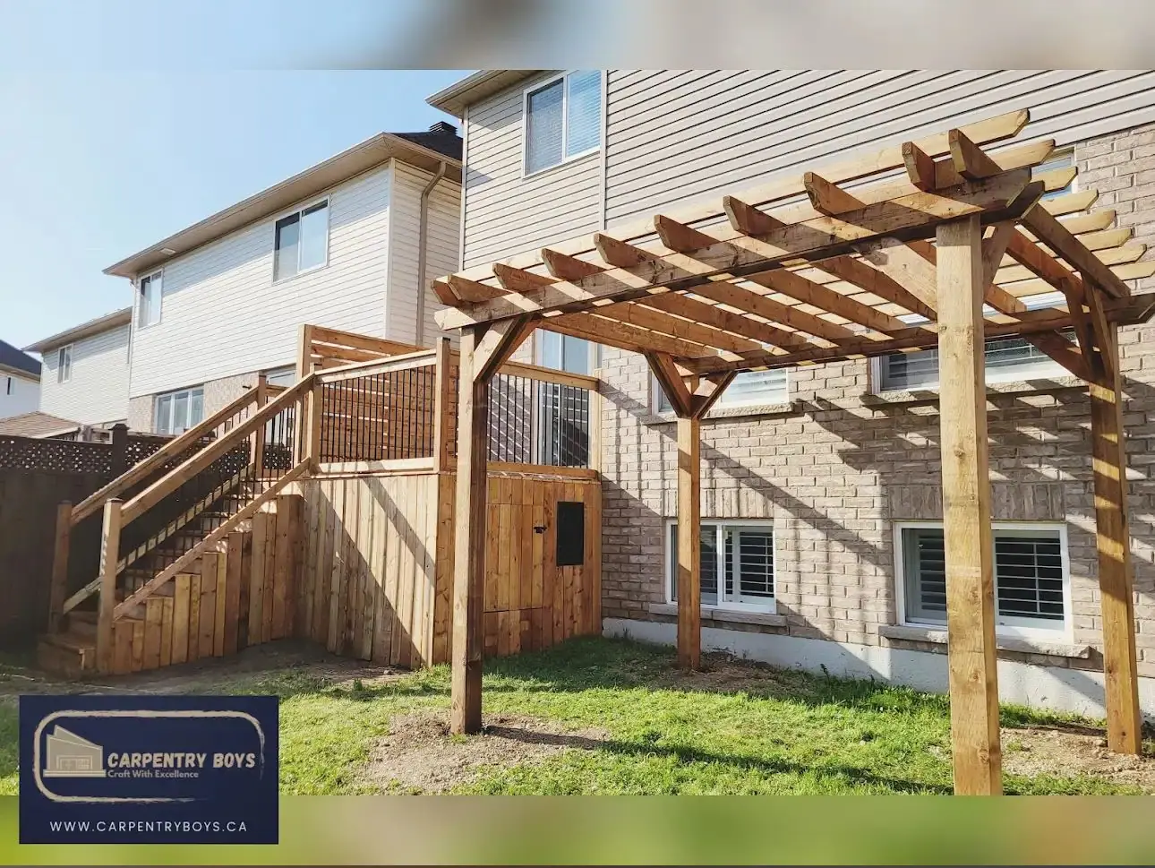 Freestanding cedar pergola beside deck stairs