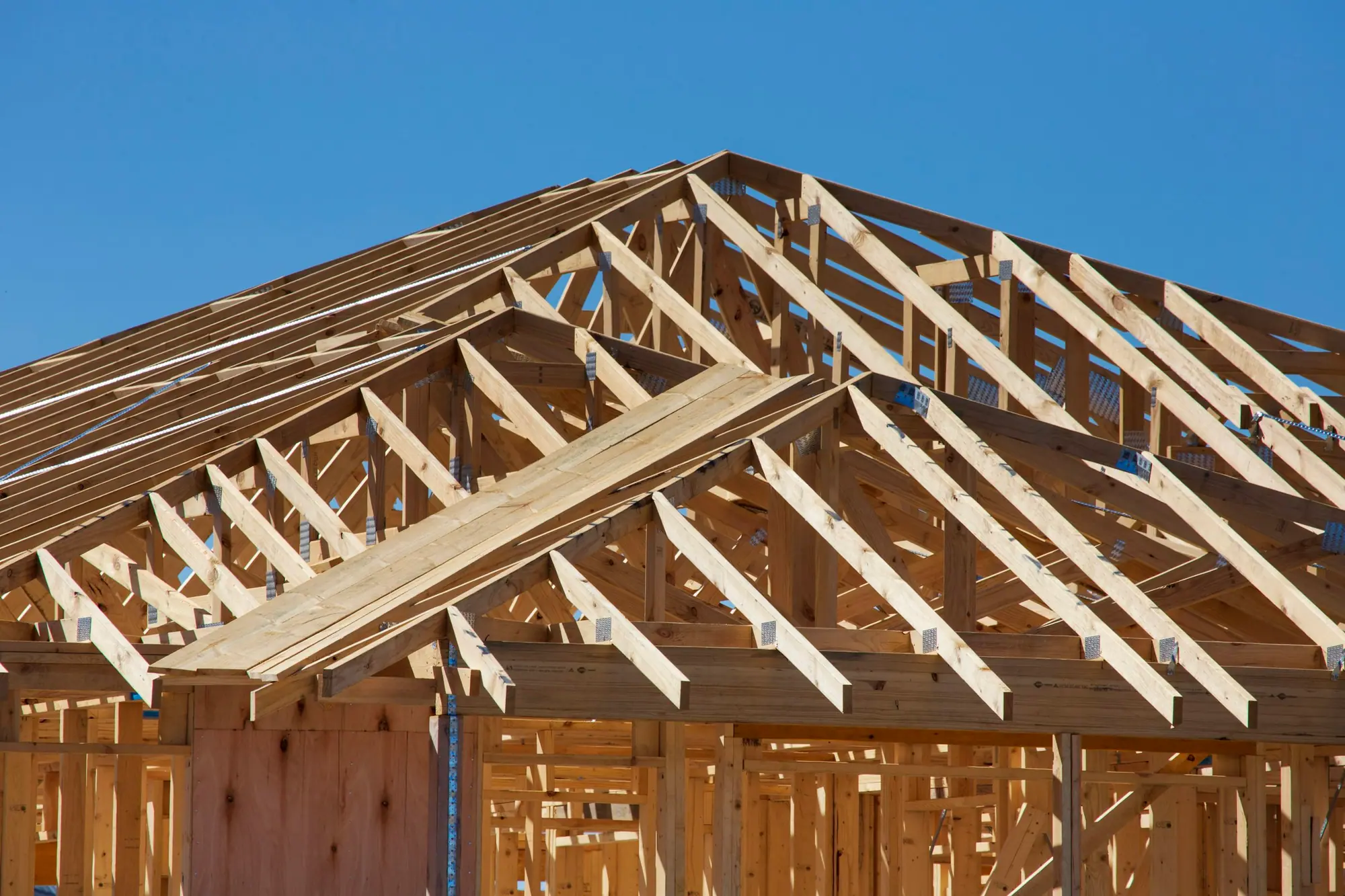 Two-storey wood-framed structure under construction
